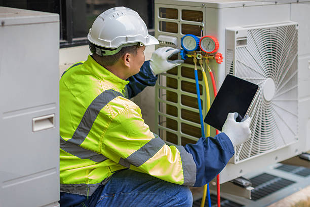 Professional Hvac technician working in Tybee Island, GA